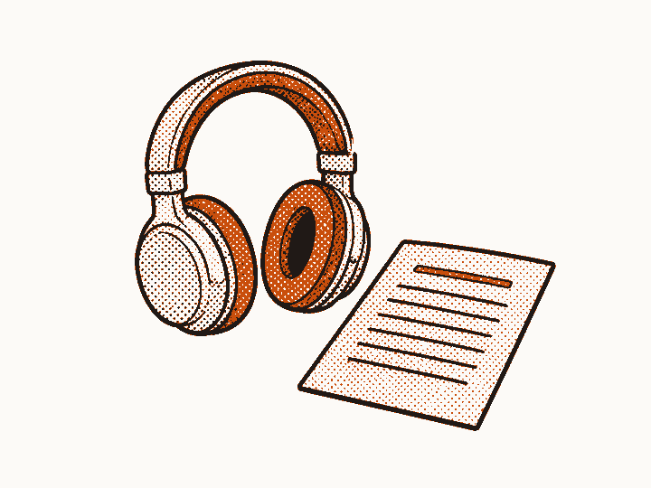 Over-ear headphones sit beside a document with ruled lines.